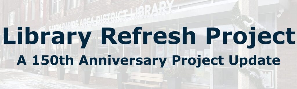 A sign in front of the library highlights the Library Refresh Project: A 150th Anniversary Project Update.