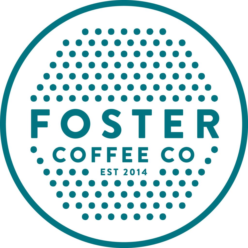A circular logo with teal dots forming a gradient pattern. In the center, bold text reads FOSTER COFFEE CO and below it, smaller text says EST 2014. The design is enclosed by a teal circle.